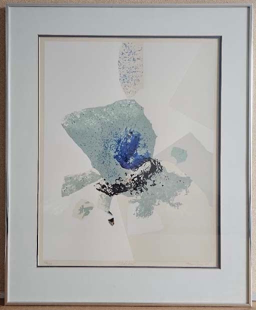 Framed abstract artwork with blue and green elements