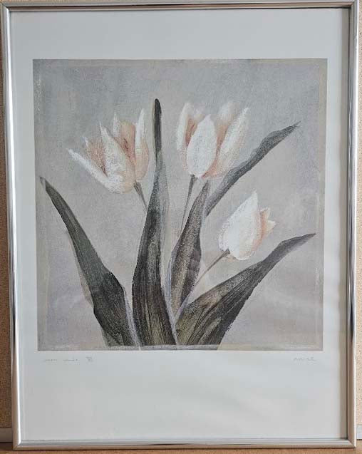 Framed artwork of white tulips on a light background