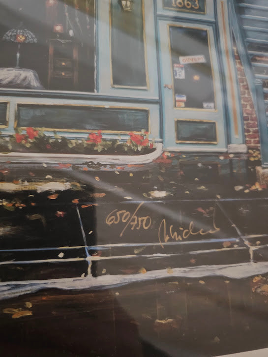 Decorative item with floral design and text on a black background