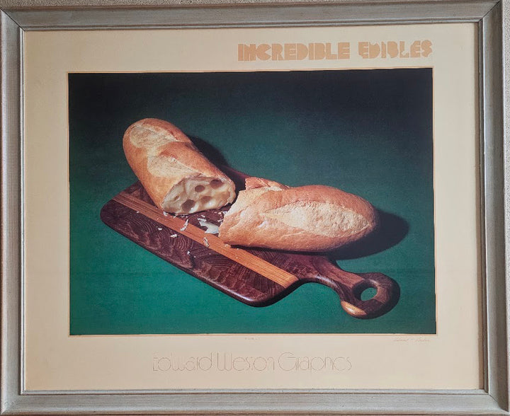 Framed artwork of bread on a cutting board with 'Incredible Eddies' text.