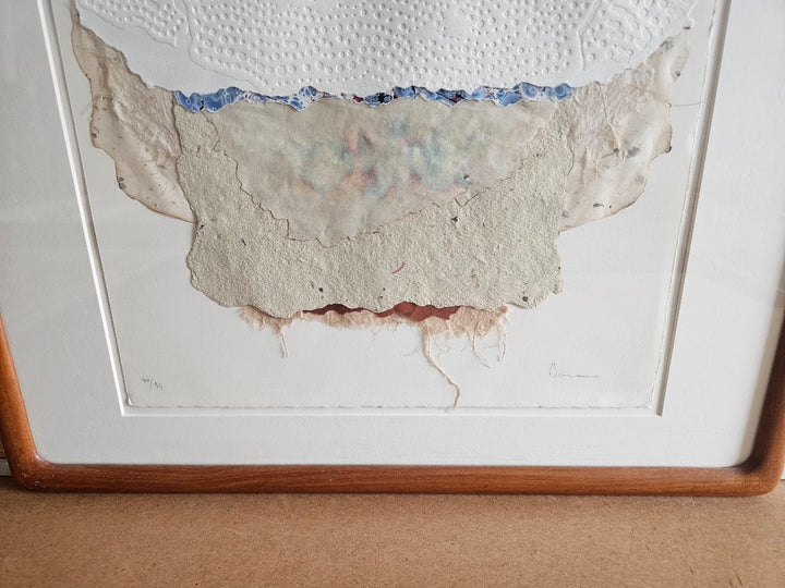 Framed artwork with a large hole in the center