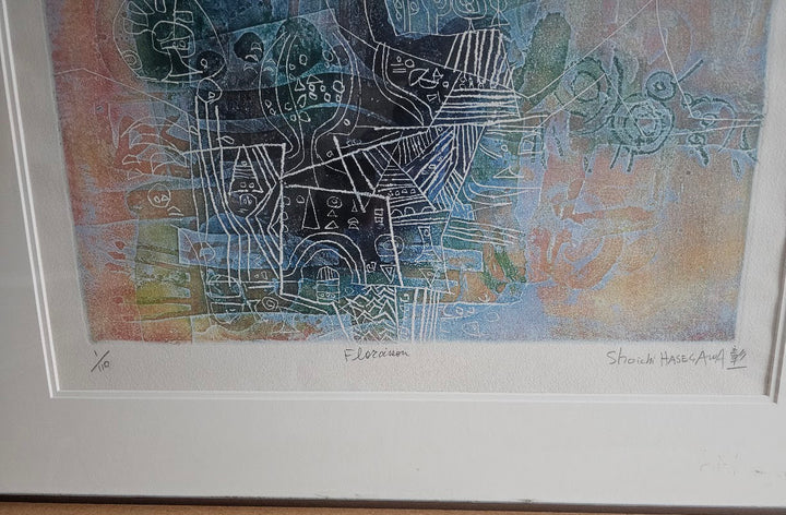 Framed abstract artwork with geometric shapes and patterns