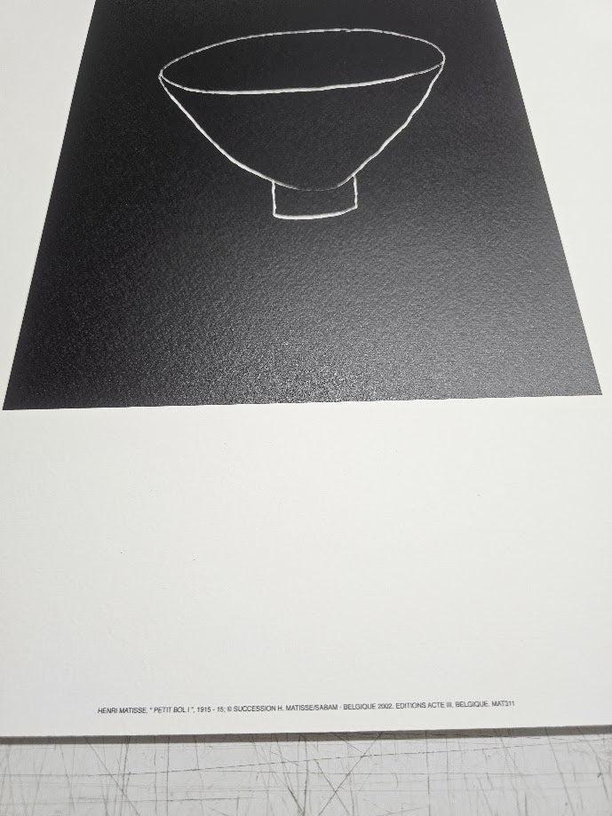 Black and white line drawing of a bowl on a textured black background