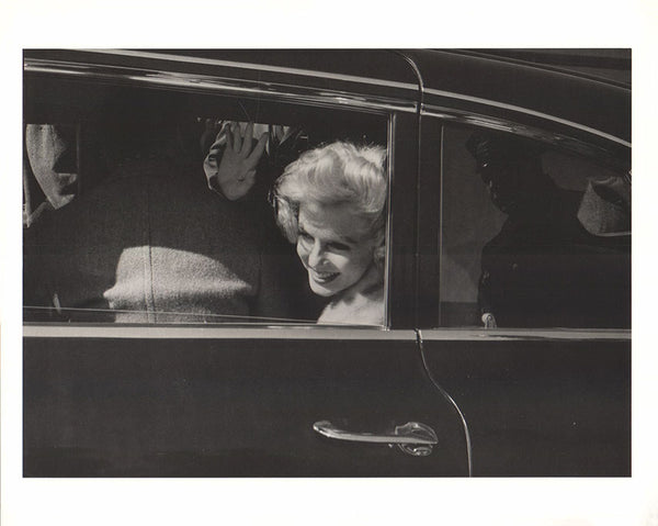 Marilyn Monroe in Cadillac limousine on drive from airport to hotel 1959 by Manfred Linus - 10 X 12 Inches (Offset Lithograph)