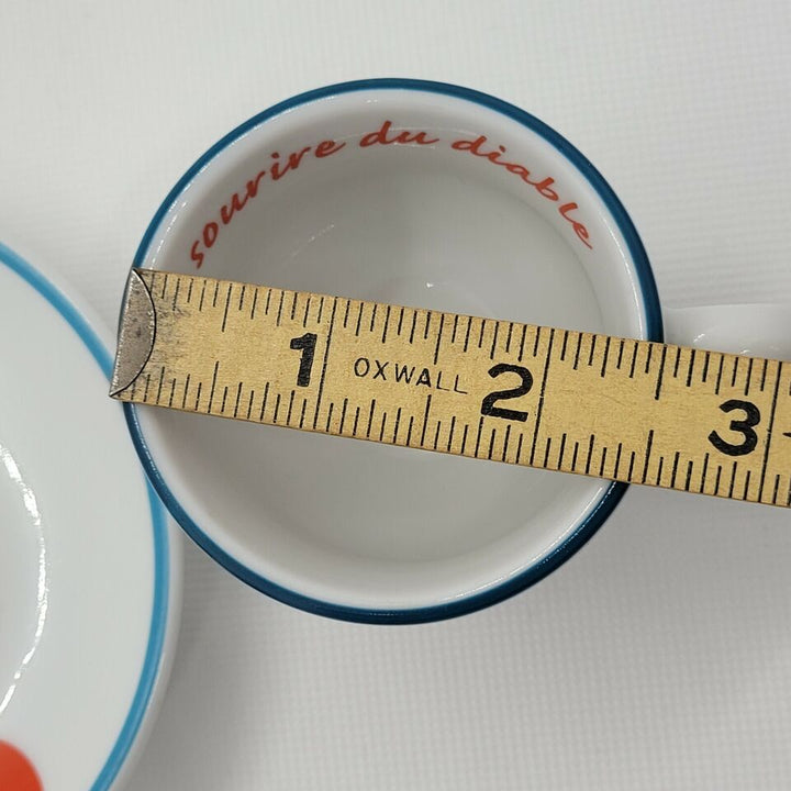 Le sourire du diable - Official 2004 René Magritte Espresso Cup + Saucer