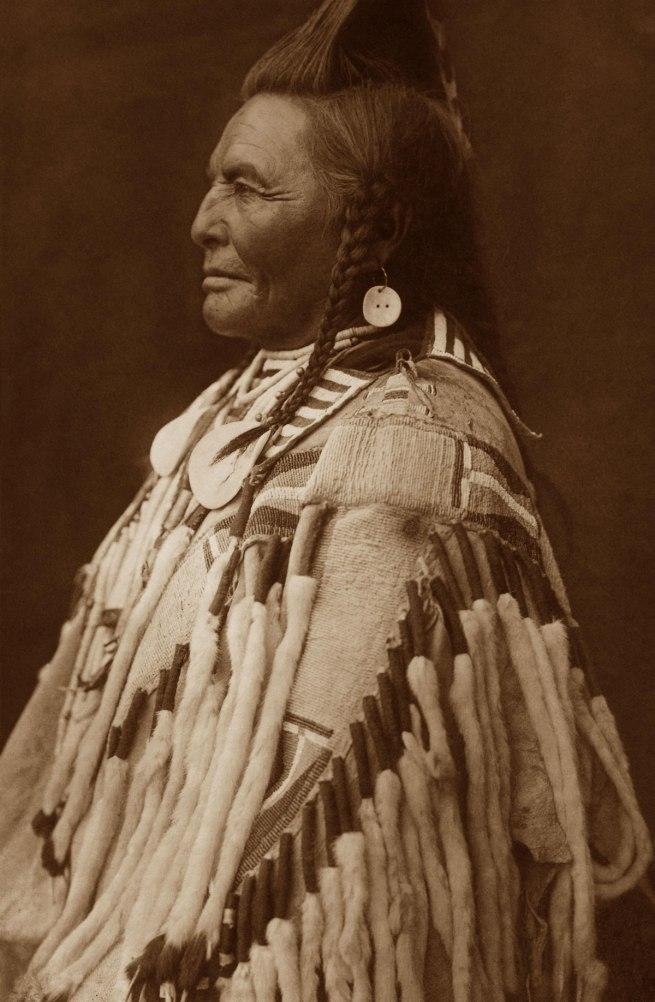 Apsaroke, Shot in the Hand, 1900 by Edward S. Curtis - 18 X 28 Inches (Art Print)