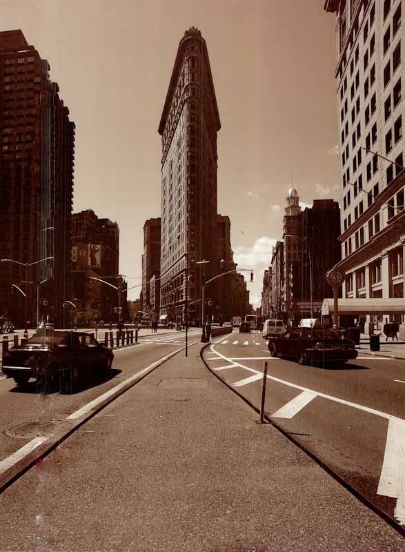 Iron Building & Taxi cab - NYC by Patrick Chatelier - 24 X 32 Inches (Art Print)
