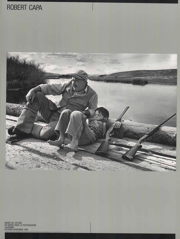 Ernest Hemingway and his Son Gregory, Sun Valley, 1941 by Robert Capa - 18 X 24 Inches (Offset Lithograph)
