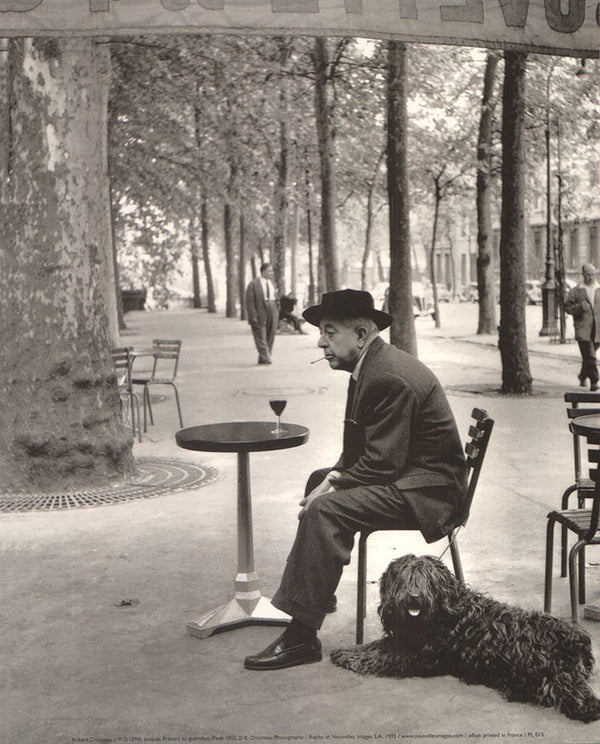 Jacques Prévert au guéridon , Paris 1955 by Robert Doisneau - 10 X 12 Inches (Art Print)