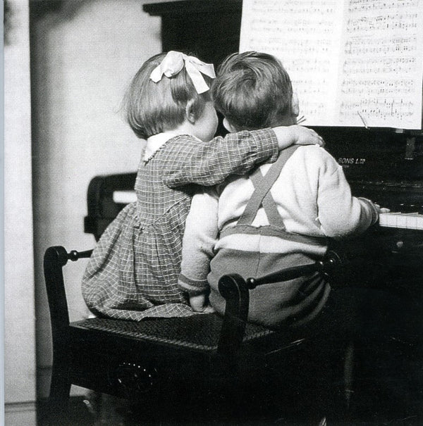 Children Playing the Piano